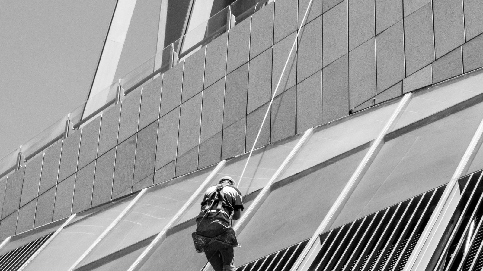 Coastal Cleaning Challenges in Sussex: Salt, Algae, Render and Windows – High Level Window Cleaning High level window cleaning for a coastal Sussex building